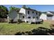 Exterior view of a two-story home with a deck and well-maintained lawn at 3045 Creek Moss Ave, Wake Forest, NC 27587
