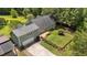 Aerial view of home featuring a spacious deck, fenced backyard, and a detached garage with carport at 3113 Golden Nugget Dr, Clayton, NC 27520