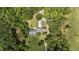 Secluded home featuring mature trees, a long driveway and a private yard at 3113 Golden Nugget Dr, Clayton, NC 27520