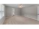 Comfortable bedroom with ceiling fan and an ensuite bathroom at 3113 Golden Nugget Dr, Clayton, NC 27520