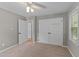Bedroom showcasing double closets and neutral colored carpet at 3113 Golden Nugget Dr, Clayton, NC 27520