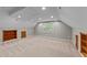 Spacious bonus room with carpet flooring, recessed lights and built-in bookcases at 3113 Golden Nugget Dr, Clayton, NC 27520