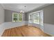 Dining room features hardwood floors, bay window and wainscoting at 3113 Golden Nugget Dr, Clayton, NC 27520