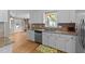 Bright kitchen with white cabinetry, stainless steel appliances and granite countertops at 3113 Golden Nugget Dr, Clayton, NC 27520