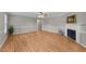 Living room with hardwood floors, fireplace, and neutral paint, creating a warm and inviting space at 3113 Golden Nugget Dr, Clayton, NC 27520