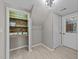 Mud room featuring a wooden storage closet with tile flooring at 3113 Golden Nugget Dr, Clayton, NC 27520