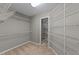 Walk-in closet providing ample storage space with shelving throughout at 3113 Golden Nugget Dr, Clayton, NC 27520