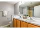 Bathroom features a double sink vanity, a large mirror, and a separate shower room for convenience at 3445 Dutchman Rd, Raleigh, NC 27610