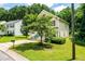 Suburban two-story home with a well-kept lawn, mature trees, and a paved driveway at 3445 Dutchman Rd, Raleigh, NC 27610