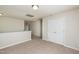 Open hallway with neutral carpet, leading to rooms with great natural light and spacious closets at 3445 Dutchman Rd, Raleigh, NC 27610