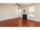 Bright living room with hardwood floors and fireplace at 3445 Dutchman Rd, Raleigh, NC 27610