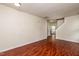 Open floor plan living room with view to stairs at 3445 Dutchman Rd, Raleigh, NC 27610