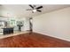 Living room and kitchen with stainless steel appliances and breakfast bar at 3445 Dutchman Rd, Raleigh, NC 27610