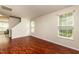 Open floor plan living room with staircase at 3445 Dutchman Rd, Raleigh, NC 27610