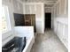Bathroom under construction featuring a tub and shower area, ready for customization and finishing touches at 360 Ambassador Dr, Clayton, NC 27520