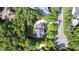 A beautiful aerial view of the backyard and home, surrounded by lush trees and greenery at 3604 Thorndike Dr, Wake Forest, NC 27587