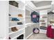 Closet with ample built-in storage for shoes, clothes, and accessories at 3604 Thorndike Dr, Wake Forest, NC 27587