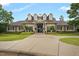 Beautifully landscaped community clubhouse with a welcoming entrance, showcasing the shared amenity space at 3604 Thorndike Dr, Wake Forest, NC 27587