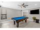 Spacious game room with a pool table, recessed lighting, and a mounted TV at 3604 Thorndike Dr, Wake Forest, NC 27587