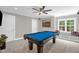 Game room with a pool table, ceiling fan, and window seat at 3604 Thorndike Dr, Wake Forest, NC 27587