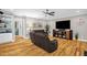 Spacious living room featuring hardwood floors, fireplace, and an open layout at 3604 Thorndike Dr, Wake Forest, NC 27587