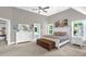 Well-lit main bedroom boasts neutral colors, natural light, and a spacious layout at 3604 Thorndike Dr, Wake Forest, NC 27587