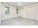 Bright bedroom with two windows, ceiling fan, and neutral walls at 3605 Iron Sight Ct, Raleigh, NC 27616