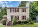 Charming two-story home with red shutters and brick steps leading to a welcoming front entrance at 3605 Iron Sight Ct, Raleigh, NC 27616
