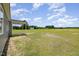 View of the green backyard and shed at 3724 Stevens Chapel Rd, Smithfield, NC 27577