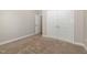 Bedroom with neutral-colored walls, carpeted floor, and a closet at 3724 Stevens Chapel Rd, Smithfield, NC 27577