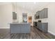 Modern kitchen with stainless steel appliances, granite countertops, and a center island at 3724 Stevens Chapel Rd, Smithfield, NC 27577