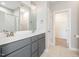 Bathroom featuring a double vanity and combination tub and shower at 3724 Stevens Chapel Rd, Smithfield, NC 27577
