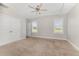 Bright main bedroom featuring neutral walls and carpeted floor at 3724 Stevens Chapel Rd, Smithfield, NC 27577