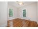 Bedroom featuring hardwood floors, natural lighting and a ceiling fan at 420 Lipscomb Grove Church Rd, Hillsborough, NC 27278