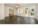 Bright bedroom with slate flooring, white trim, large windows, and access to an outdoor deck at 420 Lipscomb Grove Church Rd, Hillsborough, NC 27278