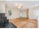 Spacious living room with hardwood floors, a ceiling fan, and natural light at 420 Lipscomb Grove Church Rd, Hillsborough, NC 27278