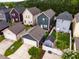 Aerial view featuring homes with well-maintained lawns in a residential neighborhood at 426 Granite Mill Blvd, Chapel Hill, NC 27516