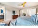 Bright and airy bedroom with a walk-in closet, ensuite bathroom, wooden dresser, ceiling fan, and comfortable furnishings at 426 Granite Mill Blvd, Chapel Hill, NC 27516