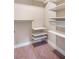 Well-organized walk-in closet with multiple shelves and hanging rods to maximize storage solutions at 426 Granite Mill Blvd, Chapel Hill, NC 27516