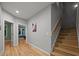 Foyer features hardwood floors, stairs, and access to the home's living spaces at 4511 Crab Creek Dr # 101, Raleigh, NC 27612