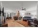 Spacious living room featuring hardwood floors, fireplace, and dining area with natural light at 4511 Crab Creek Dr # 101, Raleigh, NC 27612