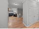 Open floor plan with hardwood floors and a staircase leading to the upper level at 4511 Crab Creek Dr # 101, Raleigh, NC 27612