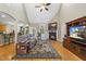 Living room showcasing a fireplace, hardwood floors, and high ceilings at 517 Belmont Cir, Wake Forest, NC 27587