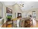 Bright living room features vaulted ceiling, fireplace, and hardwood floors at 517 Belmont Cir, Wake Forest, NC 27587