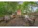 Backyard seating area with mature trees at 520 Park Ave, Rocky Mount, NC 27801