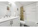 Bright bathroom featuring white vanity, toilet, and shower/tub combination at 520 Park Ave, Rocky Mount, NC 27801