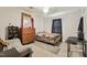 Standard bedroom with bed, dresser, and small table; features carpeted floor at 520 Park Ave, Rocky Mount, NC 27801