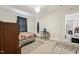 Cozy bedroom with neutral walls and carpet, furnished with a bed and side table at 520 Park Ave, Rocky Mount, NC 27801