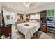 Primary bedroom with ensuite bathroom and custom built-in headboard with storage at 520 Park Ave, Rocky Mount, NC 27801