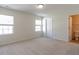 Spacious bedroom with neutral walls, natural light and ensuite bathroom access at 5225 Big Bass Dr, Raleigh, NC 27610